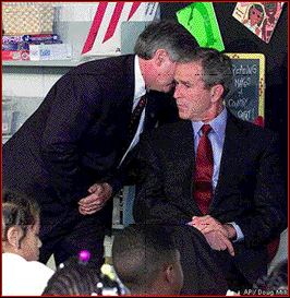 President Bush receives word of terrorist attacks while in Florida school room.