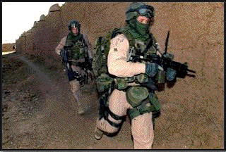 Navy, U.S. Marines are seen raiding an al-Qaida compound in Helmand province on Jan. 1.